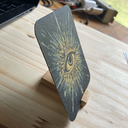 Pintura original em tinta acrílica retratando um olho com luzes